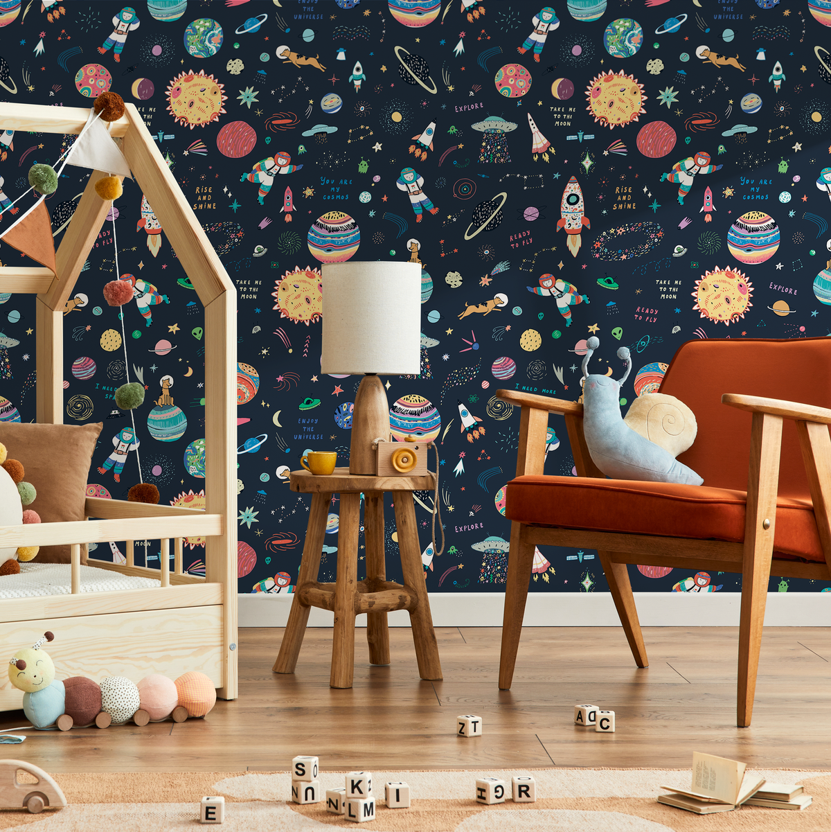 Space Wallpaper with Whimsical Astronauts and Planets in Navy Blue, Red, and Yellow - detail view