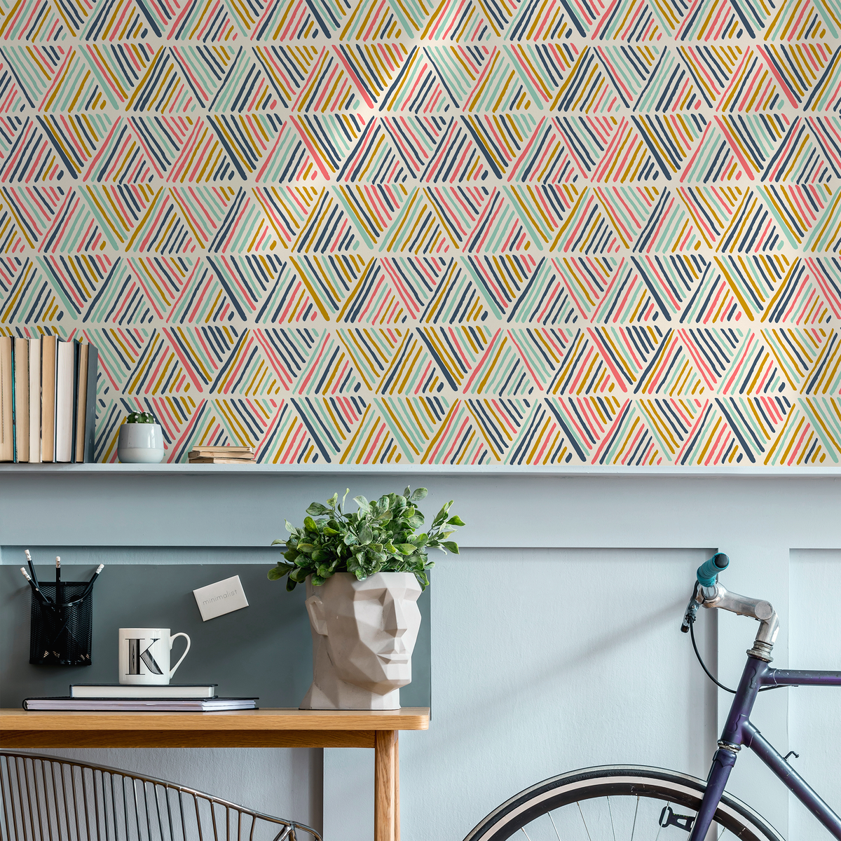 Geometric Wallpaper with Abstract Triangles in Pink, Blue, and Yellow - detail view