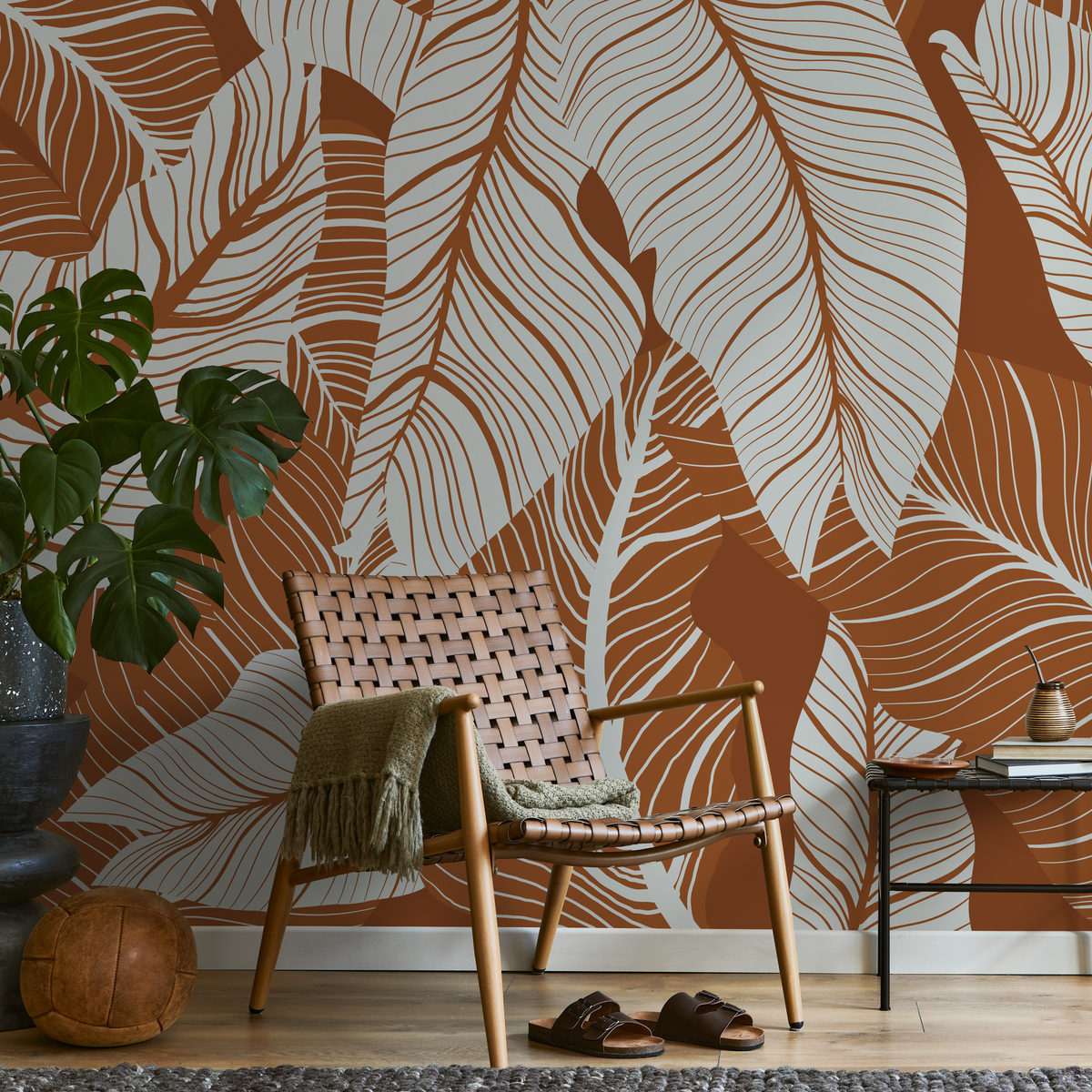 Botanical Wallpaper Featuring Large Tropical Leaves in Terracotta and Gray - detail view