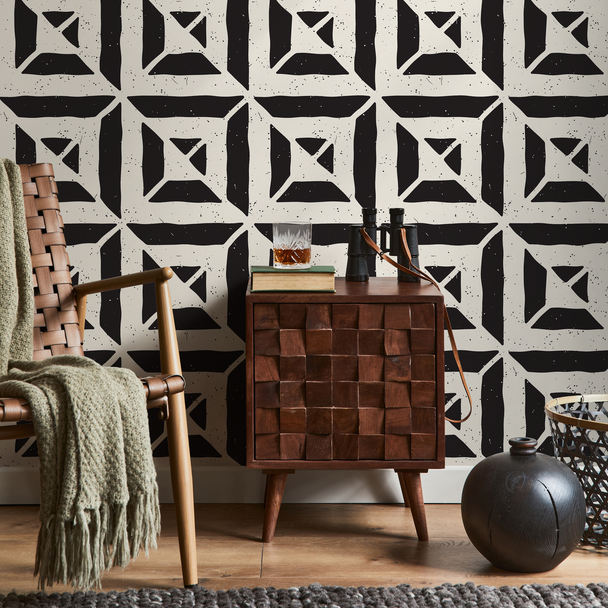 Geometric Wallpaper with a Distressed Block Print Motif in Black and Cream - detail view