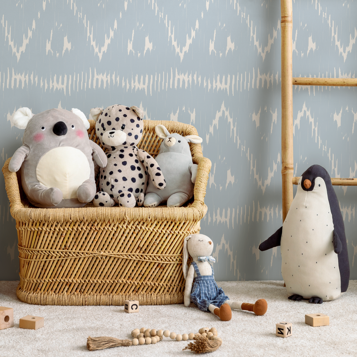 Boho Wallpaper Featuring a Distressed Ikat Motif in Light Blue and Cream - detail view